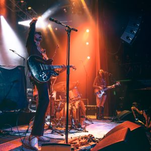 Photo of Pink Fuzz performing at the Gothic Theatre on August 19, 2025